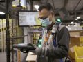 Amazon says vaccinated workers can ditch masks starting next week