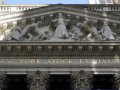 Stocks shake off a wobbly start, end higher on Wall Street