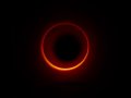 In a photo of a black hole, a possible key to mysteries