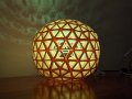 A Raspberry Pi powered snapology origami sunrise lamp, night light and disco ball