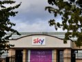 Sky shares soar on Comcast takeover victory