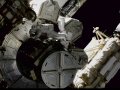 Spacewalking astronauts tackle hoses, other station odd jobs
