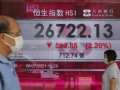Asian stocks mostly lower after Wall Street highs