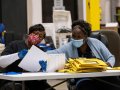 The Latest: Ballot counting paused in large Georgia county